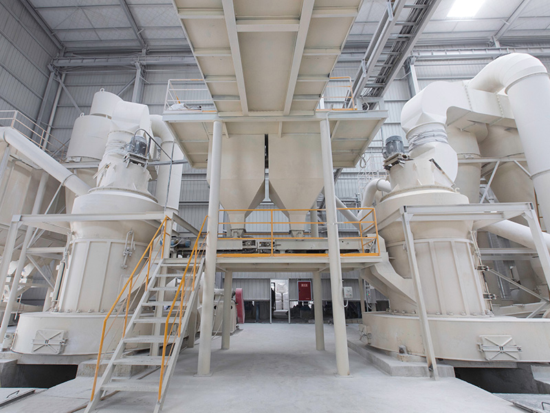 4R3220 pendulum raymond mill small raymond mill for calcite powder making plant 9 a large white machine inside a building